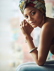 Image showing Portrait, young black woman and turban fashion, style and trends, confidence and pride in natural beauty, edgy african culture and unique heritage. Black girl, stylish headscarf and african print