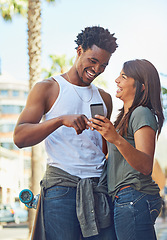 Image showing Happy, smile and couple on a phone in city watching a comic, comedy or funny video on social media. Happiness, love and interracial man and woman scrolling online on the internet in urban town road.
