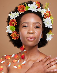 Image showing Portrait, beauty or makeup black woman with flower hair crown in brown studio background for skincare or luxury wellness. Spring, face cosmetics or model African American girl with aesthetic flowers