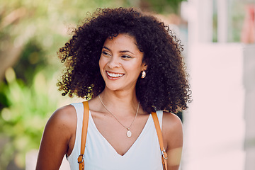 Image showing Woman, smile and happy with backpack for travel, holiday or walking in small town in Mexico. Female, bag and attractive happiness on face as tourist walk in city, afro or happiness and vacation
