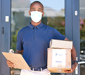 Image showing Delivery, black man and covid face mask with a box and clipboard at door for export courier service with safety compliance. Logistics, ecommerce and shipping worker with package during coronavirus