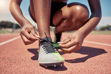 Image showing Fitness, tie shoes lace or black womanman runner for running training, wellness or sport on track for race, marathon or event. Health, hands or male athlete for sports exercise or workout cardio