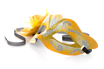 Image showing Two yellow venetian masks