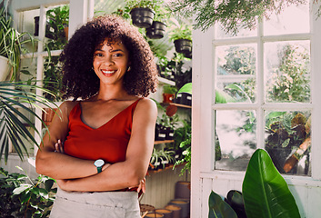 Image showing Black woman, arms crossed or plant shop worker and agriculture knowledge, carbon footprint innovation or growth ideas. Portrait, smile or happy florist, garden center employee or small business owner