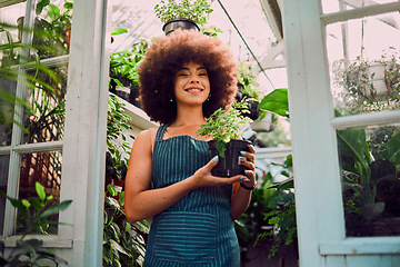 Image showing Plant, growth and portrait of black woman in greenhouse for environment, agriculture and florist in small business. Sustainability, spring and garden with girl in nursery for herbs, organic and farm