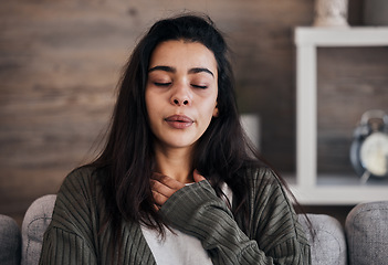 Image showing Depression, sad and woman with eyes closed in home thinking of problems. Anxiety, mental health and unhappy, depressed and lonely female on sofa in living room trying to calm down and relax in house.