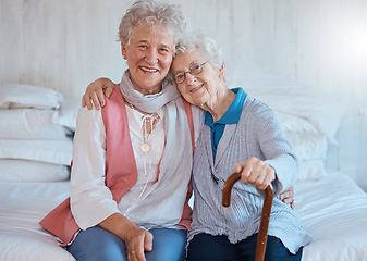 Image showing Senior friends, portrait and happy smile, hug and support on a bed in a retirement house, love and care. Elderly women, happiness and connection together in nursing home bedroom in life or friendship