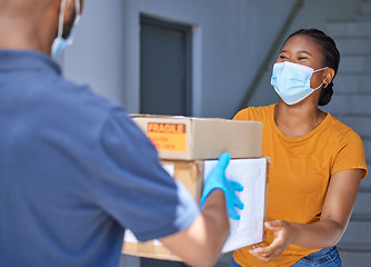 Image showing Delivery box, shipping and happy customer with covid face mask for safety compliance at front door for logistics, supply chain and ecommerce product. Black woman with courier service man for package