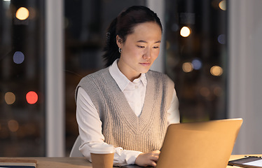 Image showing Overtime, email and business woman on a laptop, typing and planning on the internet in a dark office. Corporate, strategy and Asian employee working on the web for a deadline on a pc at night