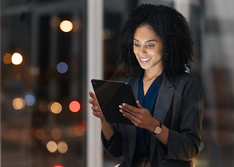 Image showing Night business, black woman and tablet for communication, marketing and data analytics online with smile for success, achievement and benchmarking results. Entrepreneur with technology for innovation