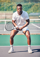 Image showing Tennis, sports and black man in portrait for game, competition and training with focus, power and energy wellness. Strong, athlete and fitness african in tennis court for outdoor body exercise