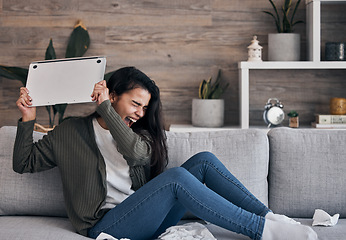 Image showing Woman on sofa, angry and throwing laptop while crying in living room, breakup email or work stress at home. Mental health, depression and sad girl on couch with computer, glitch or 404 error burnout