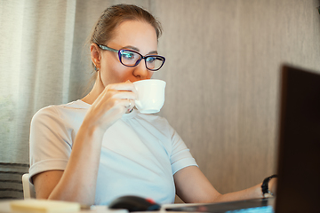 Image showing Woman in quarantine for coronavirus working from home