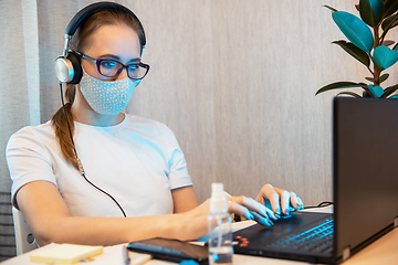 Image showing Woman in quarantine for coronavirus working from home