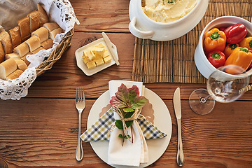 Image showing Food, breakfast and top view, meal and nutrition with plate, healthy with pepper, bread and butter on table. Nutrition, napkin and cutlery for feast, healthy dish and lunch in home during morning