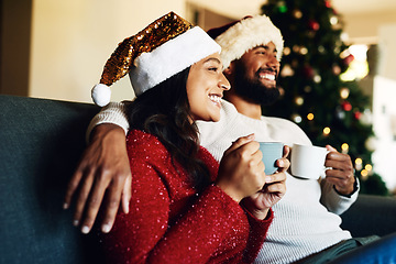 Image showing Christmas, black couple and coffee or tea on sofa in living room while thinking about holiday celebration, shopping and home memory. Man and woman on couch with love, care and excited to celebrate