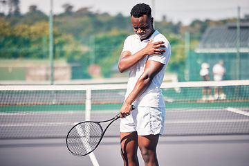 Image showing Sports, tennis and arm pain on court after training, game or match outdoors. Healthcare, tennis player and injured black man or athlete with muscle pain or inflammation after exercise or workout.