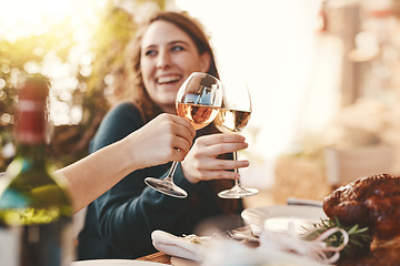 Image showing Wine, glasses and toast people at restaurant for thanksgiving, holiday celebration and fine dining lifestyle in winery or hospitality. Champagne, alcohol and woman celebrate, cheers and social event