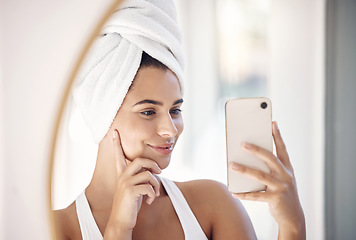 Image showing Mirror selfie, skincare and woman with phone for beauty, facial cleaning and hair care in a bathroom. Social media, self care and face reflection of a girl with a photo on a mobile of morning routine