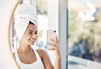 Image showing portrait, phone selfie and woman, towel and bathroom for skincare, beauty and cleaning in mirror reflection. Face, girl and smile for picture after facial treatment, grooming and hygiene with a smile
