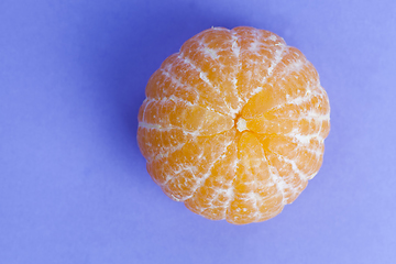 Image showing orange on a purple background