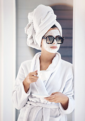 Image showing Woman, beauty and skincare mask, tea and sunglasses at luxury spa, hotel and face mask while relax outdoor. Young female, bathrobe and facial outdoor, cosmetics and skin care with face wellness