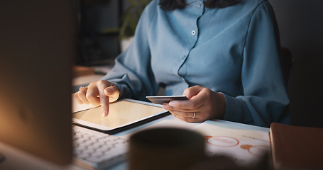 Image showing Credit card, tablet and online shopping with a business woman in office at her desk late in the night. Hands, finance and payment with a female employee making a purchase while working overtime