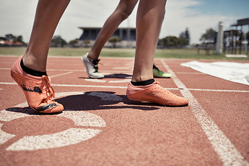 Image showing Feet, athlete and sports race at stadium for marathon or sprint competition with people ready to start running and training at line. Shoes of man and woman for sport, cardio and run for speed outdoor