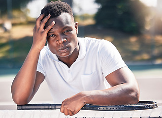 Image showing Black man, tennis and stress, anxiety with fitness and outdoor on tennis court, holding head and frustrated, game fail or mistake in training. Exercise, wellness and sport portrait with angry athlete