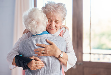 Image showing Elderly women, hug and nursing home, friends and support, comfort and care, together with bond. Senior people hugging, retirement and love with friendship in retirement home and connection.