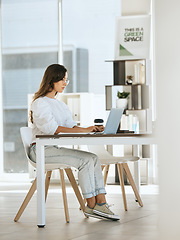 Image showing Woman, working and laptop at digital marketing company, eco startup and work with technology at desk. Green business, seo content writing and online research for blog post or social media advertising