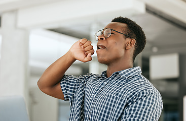 Image showing Tired, yawn and business black man on laptop in office workplace for startup management, company report and market research. Fatigue, burnout and mental health risk of corporate employee at his desk