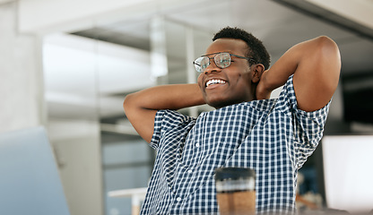 Image showing Business black man relax at his office desk for finance, sales and company development, startup success or kpi achievement. Stretching businessman happy for career, job productivity or online review