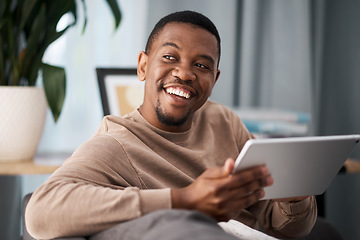 Image showing Black man, digital tablet and social media, living room home and streaming app, reading ebook or online shopping on technology. Happy guy, wifi connection and relax in lounge, wifi internet and ideas