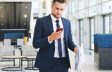 Image showing Phone, reading and business man check investment growth of stock market trading, cryptocurrency or financial economy. Documents, building lobby and trader review bitcoin, nft or forex data analytics