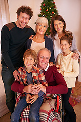 Image showing Christmas, happy and big family portrait in home with young children, parents and grandparents. Happiness, love and festive holiday celebration with kids, grandma and grandpa together in house.