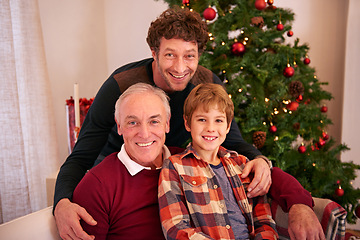 Image showing Christmas, family and holiday portrait with grandpa on home living room sofa with young kid. Smile, big family and festive vacation celebration with child, dad and grandparent in house.