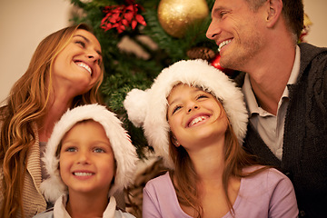 Image showing Christmas, family and happiness of children and parents together to celebrate holiday with love, smile and care. Face of man, woman or father, mother and kids in house for xmas celebration fun
