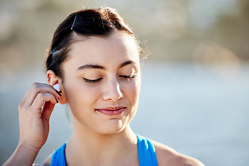 Image showing Fitness, podcast and sports woman in headphones ready to start training, running exercise or cardio workout in nature. Runner, relaxing and happy girl in earphones listening or streaming radio music