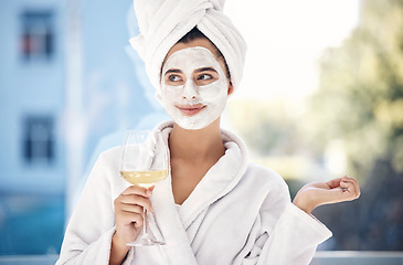 Image showing Wellness, woman and skincare mask with wine for relaxing self care, facial and beauty routine. Luxury, cosmetic and aesthetic care of girl thinking in robe with glass of alcohol in Brazil home.