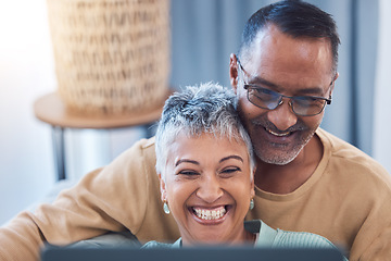 Image showing Senior couple, happy and laptop while online streaming movie, show or comic video and laughing at meme using home wifi on social media. Face of man and woman in lounge to search internet for fun