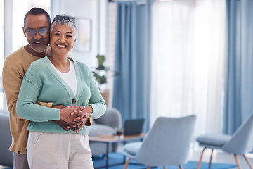 Image showing Senior couple, love and hug with space in home living room with a smile, happiness and care portrait for marriage mockup. Portrait of a indian man and woman together for support in retirement