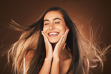 Image showing Beauty, hair and woman with hair care and cosmetic advertising, shine with glow and keratin treatment. Skincare, makeup and natural cosmetics with happy model against brown studio background.