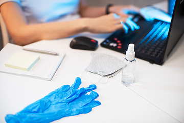 Image showing Woman in quarantine for coronavirus working from home