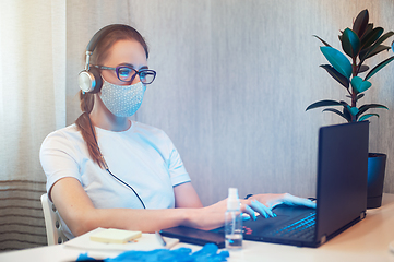 Image showing Woman in office working with laptop