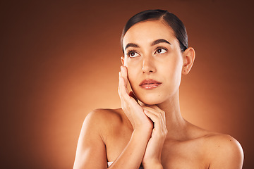 Image showing Idea, skincare and woman with beauty makeup, spa wellness and self love glow against a brown studio background. Cosmetics, marketing and thinking model with luxury cosmetic care and dermatology