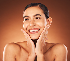 Image showing Beauty, happy and woman excited about skincare, glow and skin with cosmetics, makeup ad dermatology treatment on studio background. Aesthetic female hands on face for health, wellness and happiness