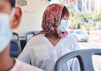 Image showing Woman, muslim and bus with mask, covid and healthcare on transport in city, town or metro by window. Islam lady, covid 19 and ppe on transportation for travel, urban adventure or thinking of safety