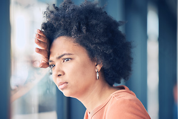 Image showing Sad, lonely and depressed woman at window waiting, thinking and looking outside. Mental health, depression and anxiety, black woman with problem, stress or debt on her mind and life crisis feelings.