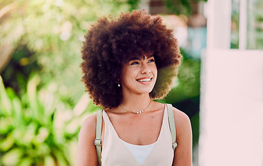 Image showing Black woman, girl and smile outdoor for wellness, break and enjoy holiday. Young female, lady and afro for confidence, happiness and relax in city, casual and trendy being stylish, edgy and chill.